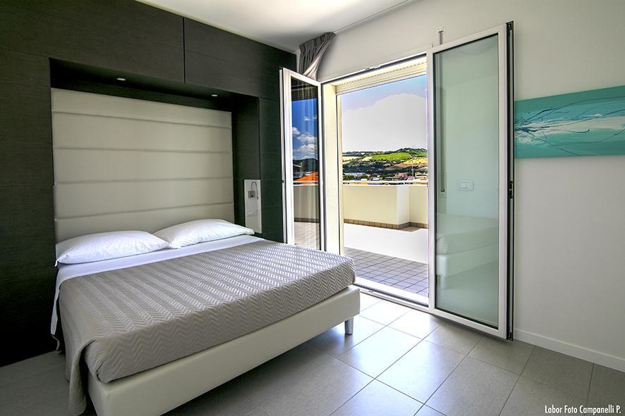 Residence Acquasuite มาร์ตินซิกูโร ภายนอก รูปภาพ