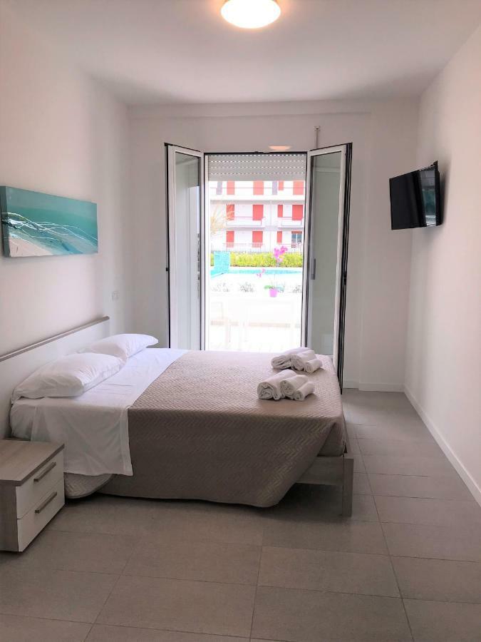 Residence Acquasuite มาร์ตินซิกูโร ภายนอก รูปภาพ